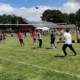 Matche de volley sur le tarrain d'honneur de foot par beau temps.